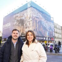 Fitur 2025: Una gran lona con la imagen de Ronda luce en el centro de Madrid